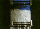 Gray filter mesh with blue residue
